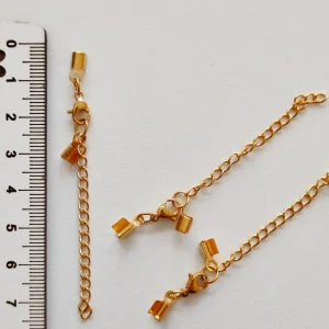 Terminais com corrente em aço inoxidável dourado